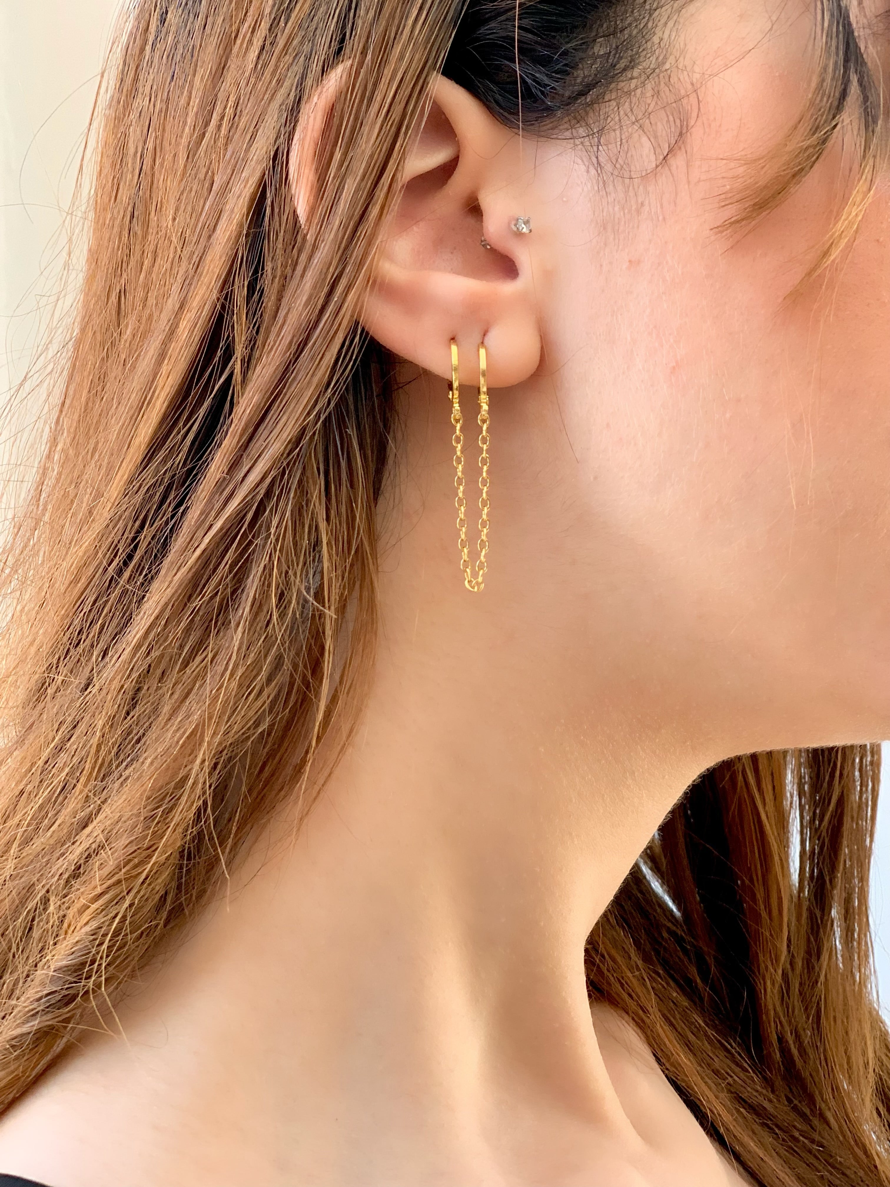 Gold chain piercing