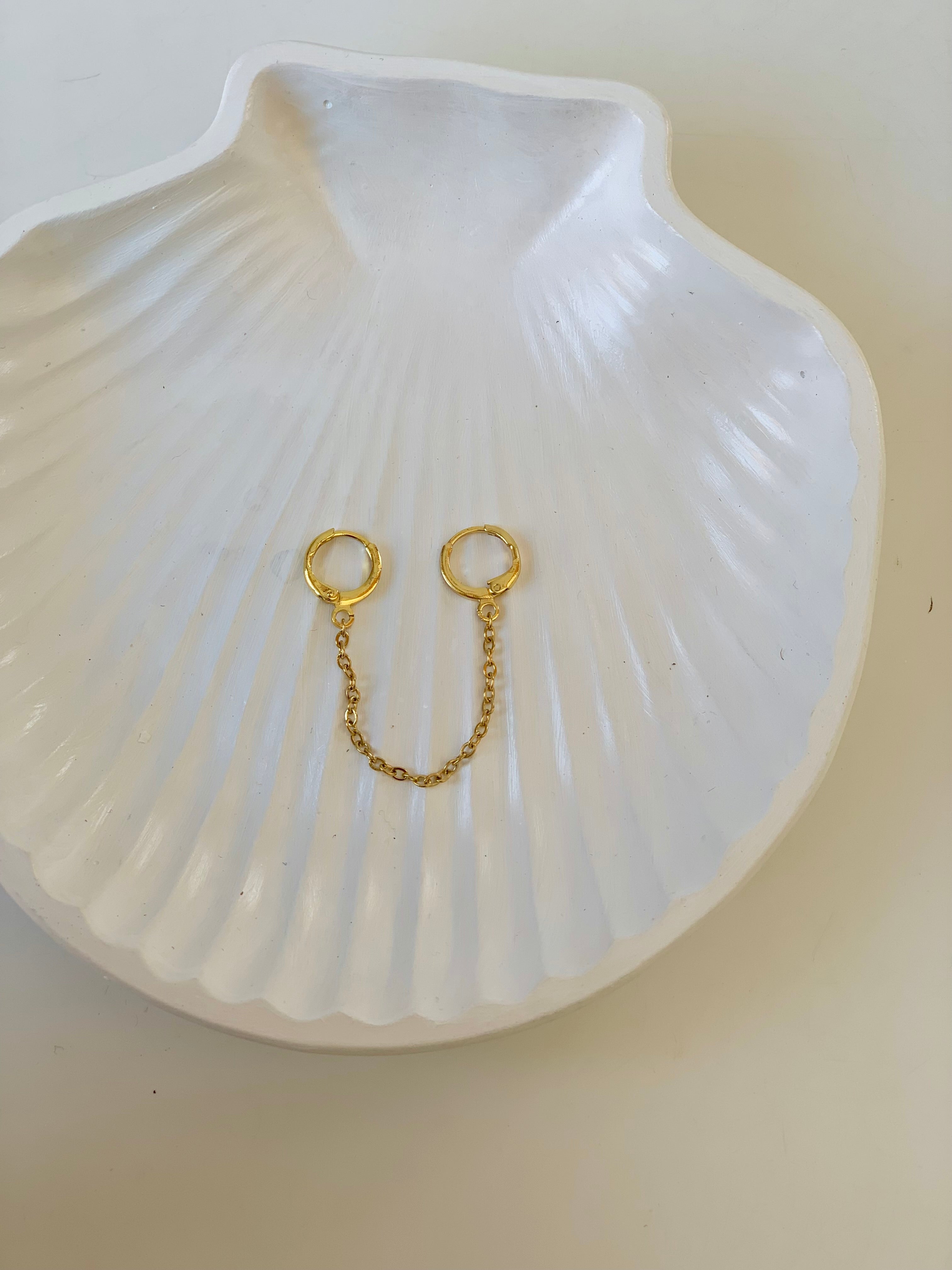 Gold chain piercing