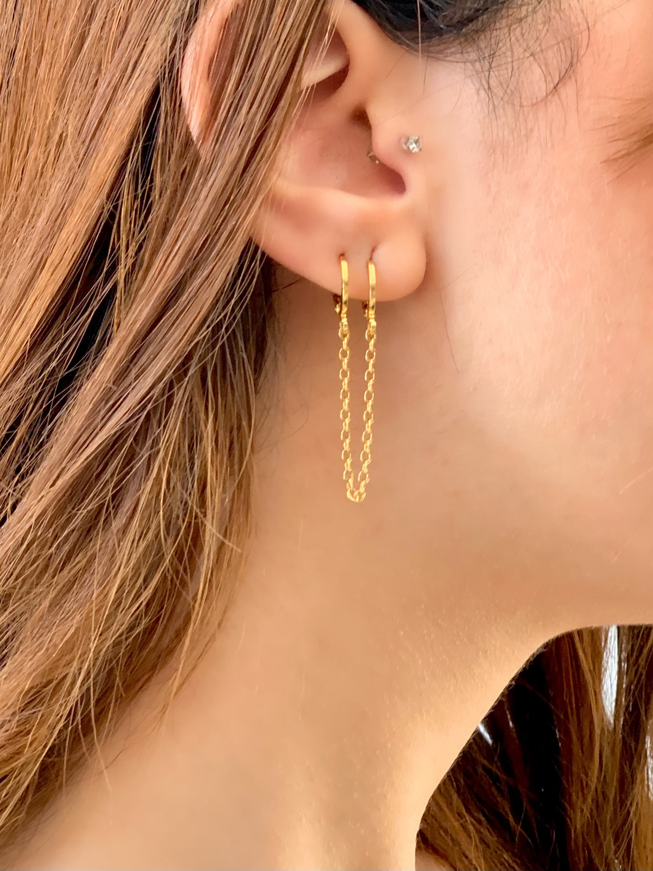 Gold chain piercing